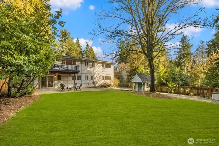 Large level fenced/gated backyard with room for boat/rv parking