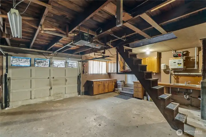 Garage with loft and built-in workspace
