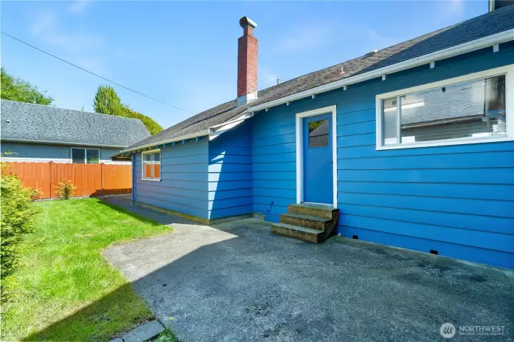 Fenced in yard with patio