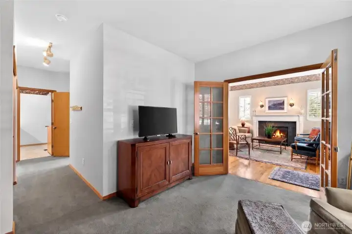 To the left are two closets with the laundry area through the doorway