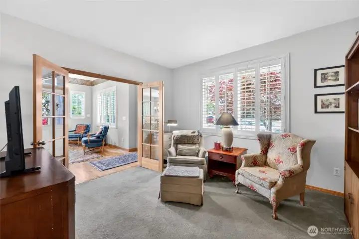 This main floor Bedroom is currently being used as a sitting room.