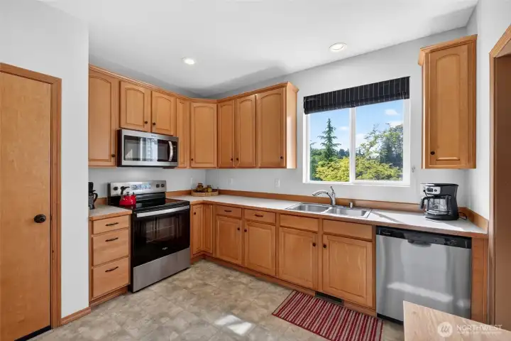 The kitchen has loads of cupboard space