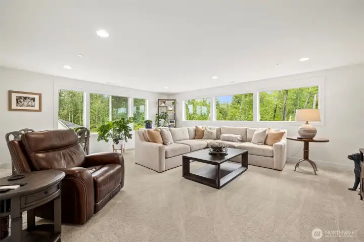 The upstairs bonus room is super versatile—it'd make a great home office, media room, or play area.