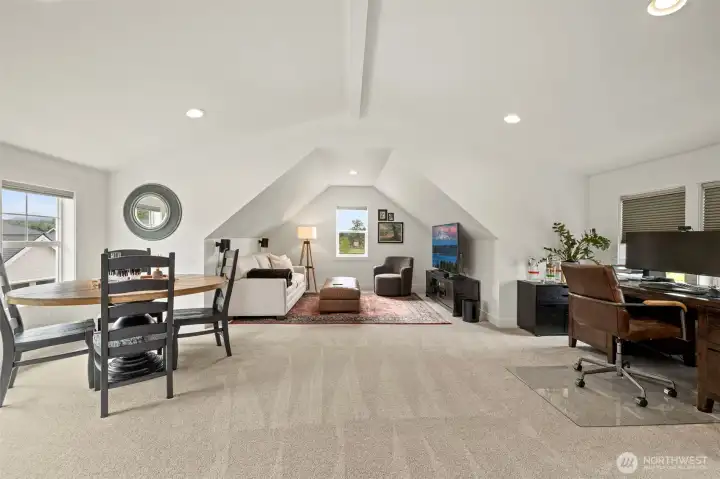 Spacious detached shop featuring a versatile finished office space above, complete with its own dedicated 3/4 bathroom.