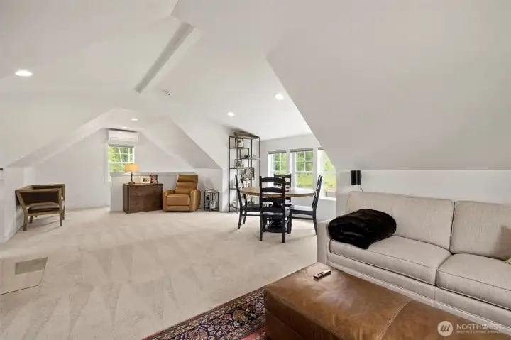 Spacious detached shop featuring a versatile finished office space above, complete with its own dedicated 3/4 bathroom.