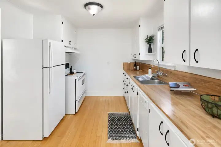 Kitchen offers plenty of space to prepare a healthy home-cooked meal.