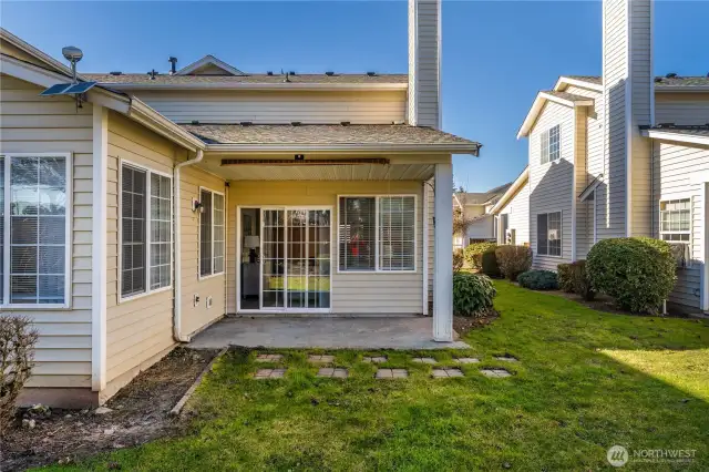 Patio in backyard is great for relaxing and enjoying your morning up of joe!