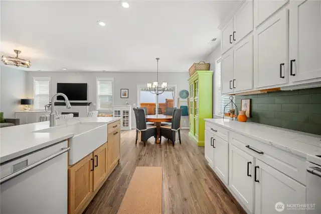 Enjoy this updated kitchen with beautiful cabinets and quartz countertops and farm sink.