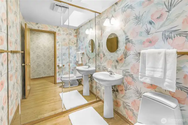 Charming Main Floor Powder Room: A thoughtfully placed half bath offering convenience and style, perfect for guests and everyday use.