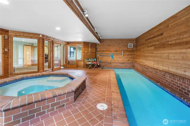 Luxurious Indoor Pool Experience: Lap pool, hot tub, and private pool room shower for fitness and relaxation.