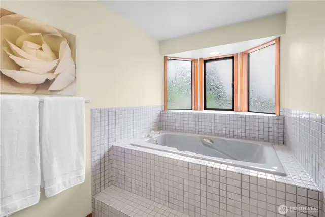 Deep Soaking Tub: Extra depth for ultimate relaxation and indulgence.