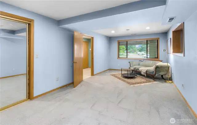 Well-Proportioned Third Bedroom: A generously sized room versatile enough to accommodate a cozy sitting nook and/or a dedicated desk area—perfect for guests, work-from-home needs, or personal retreat.