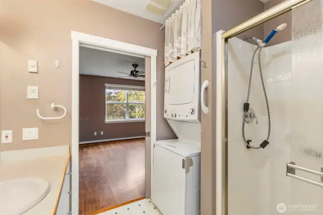 Bathroom access from both main bedroom & living areas. Laundry conveniently located there as well.