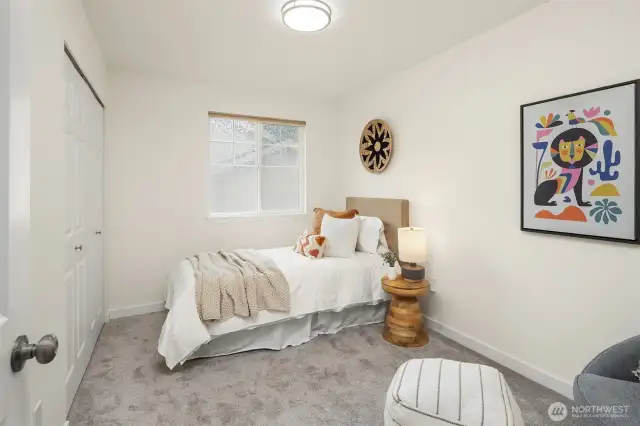 Upstairs bedroom #3 with a secret room that is perfect as a kid's hideout, storage, or hobby room.