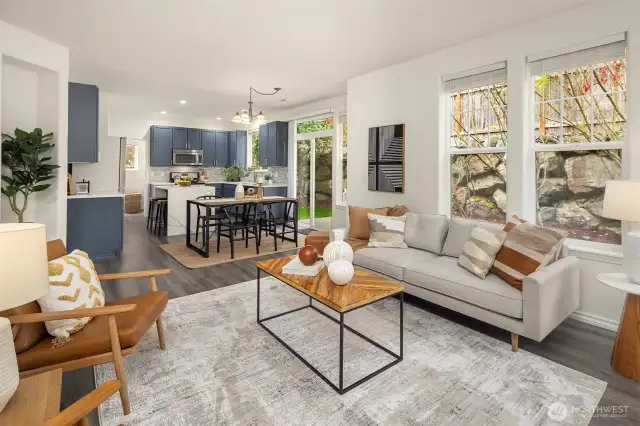 Looking from the living area to the updated and open concept kitchen.