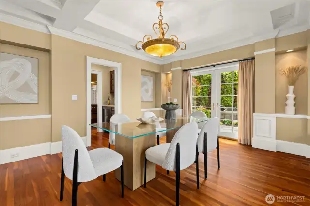 Just off the dining room is the wet bar and kitchen.