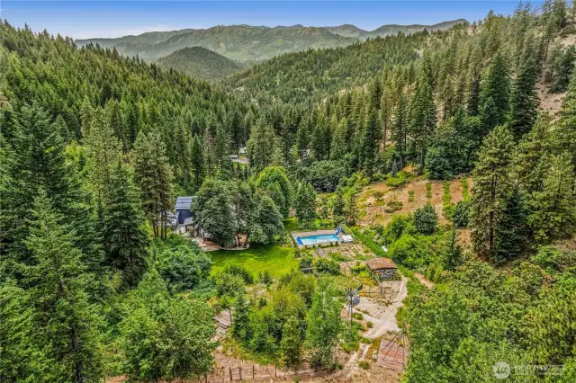 Welcome to this hidden, mountain sanctuary - the ultimate blend of seclusion, serenity, and natural beauty.