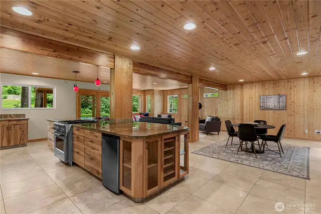 With its chef-ready range, and open flow to spacious dining and lounging areas, this warm and woodsy retreat is built for hosting any type of gathering!