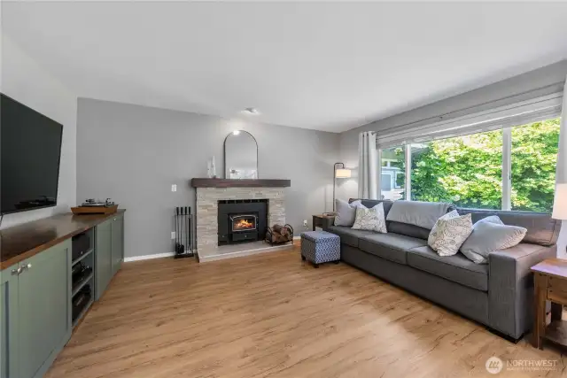 Charming Fireplace Creates a Cozy Atmosphere Year-Round.
