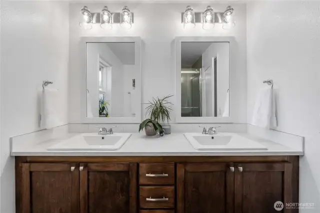 Chic Double Vanity Featuring Contemporary Finishes.