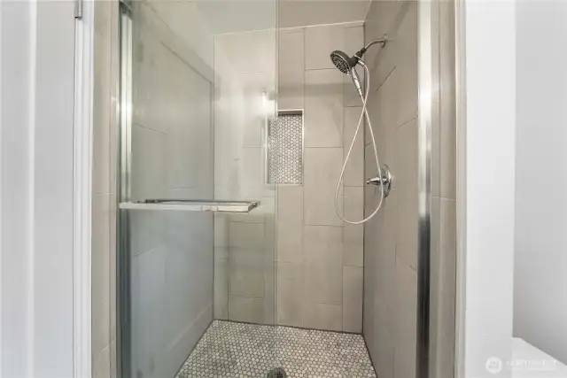 Beautifully Tiled Shower with Modern Elegance.