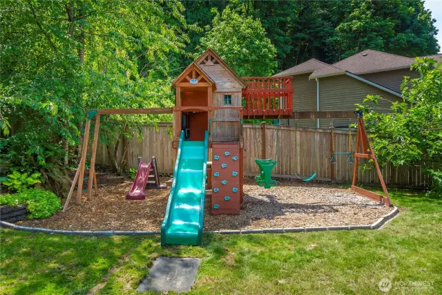 Swingset Adds a Playful Touch to the Spacious Backyard!