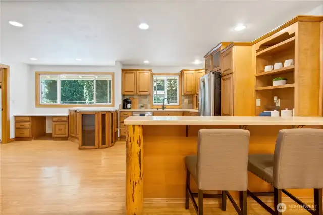 View from dining area. beautiful crafted cabinets with under lighting in cabinets