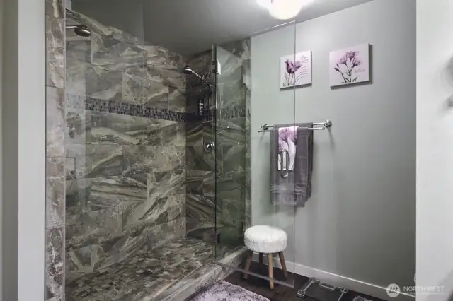 Beautiful custom shower in the primary bathroom.