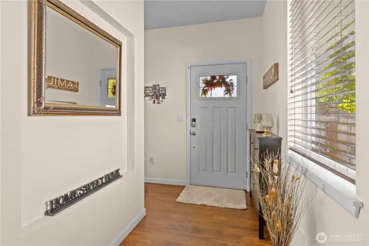 Warm entry with room for a bench or small storage