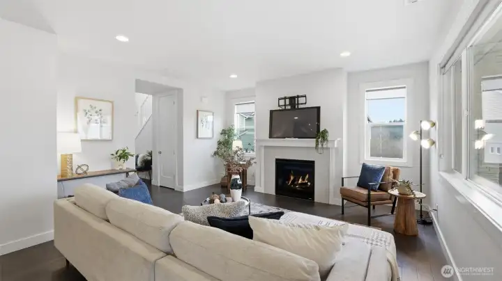 This is the perfect space to unwind offering warmth, comfort & light.