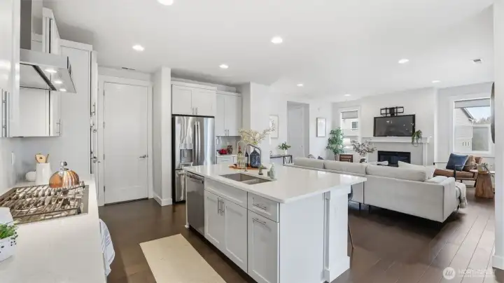 This spacious kitchen flows effortlessly into the cozy living area—perfect for everyday living.