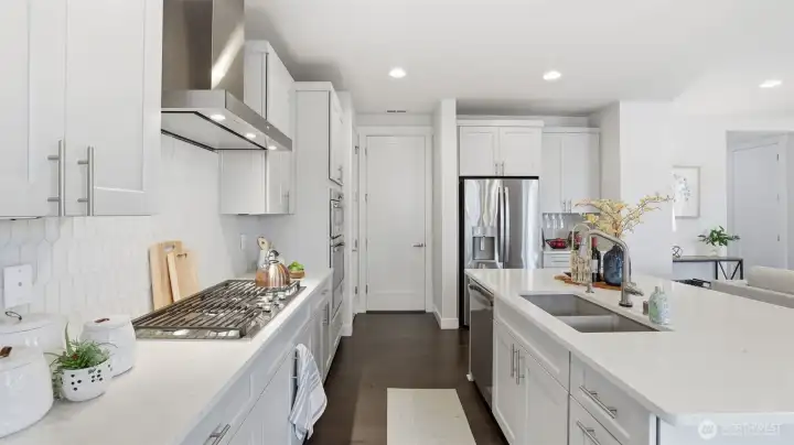 A contemporary kitchen made for both creativity and convenience.