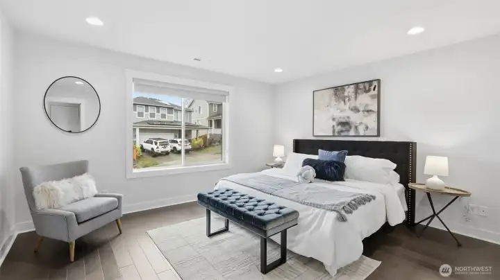 A peaceful primary bedroom designed for rest, relaxation, and everyday comfort.