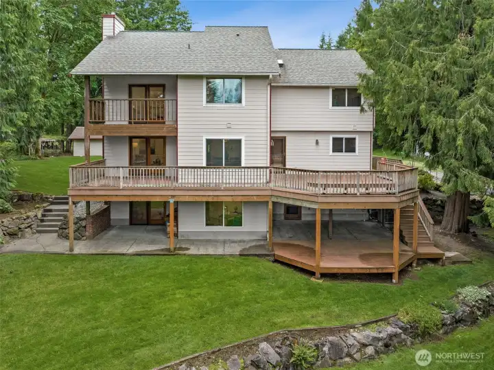 Enjoy 3 levels of living both inside and out.  A/C will keep you cool in the summer and the wood stove nice and warm in the winter.