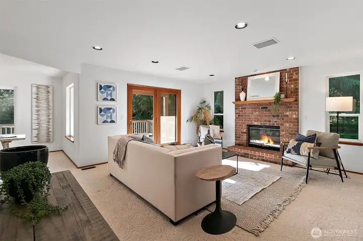 The formal living room is light and bright and connects with the dining room