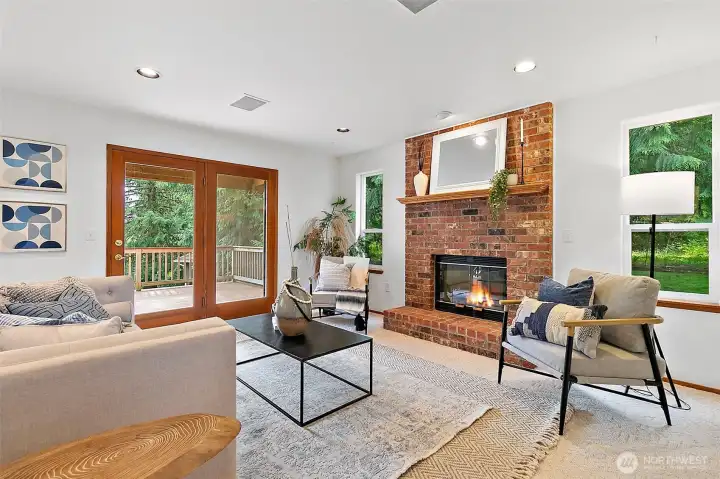 Enjoy winter evenings in front of the gas fireplace and open french doors in the summer to soak up the fresh summer evenings on the massive deck beyond.