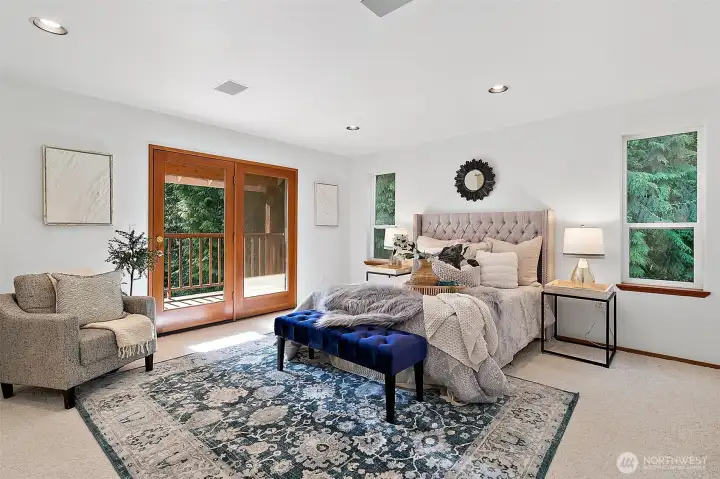 Upstairs is the large primary bedroom suite with its own deck to enjoy the ambiance surrounding this home.