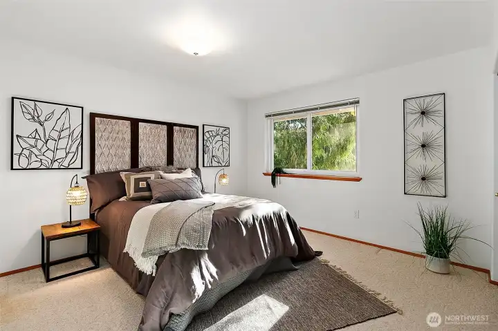 Bedroom 2 of a total of 4 large bedrooms on the upstairs level. 4th bedroom not shown.