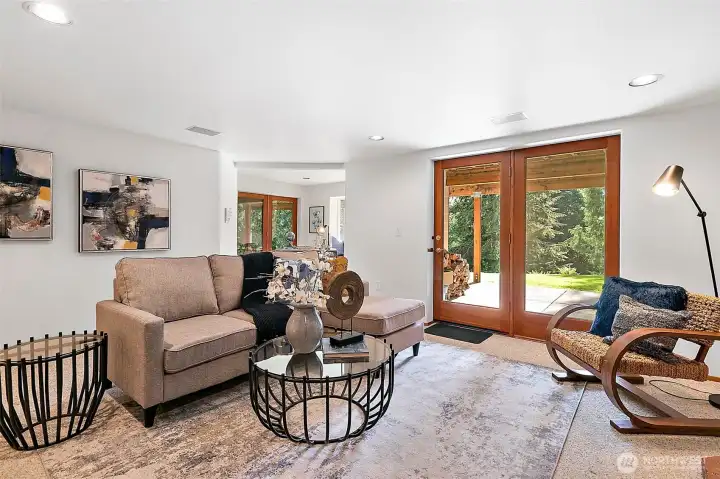 Access to the private patio and hot tub gazebo beyond the french doors off the rec room and lower patio