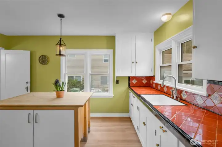 Open door at left leads to the lower level.