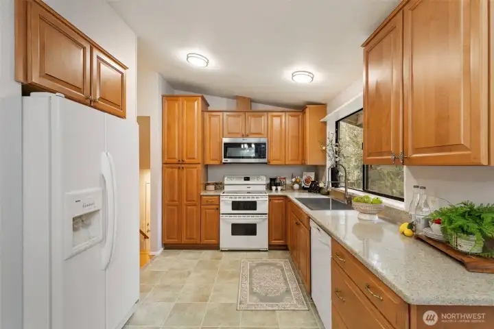 Double oven, fridge, dishwasher, and microwave all convey.