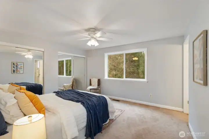 The primary bedroom has double closets and an ensuite.