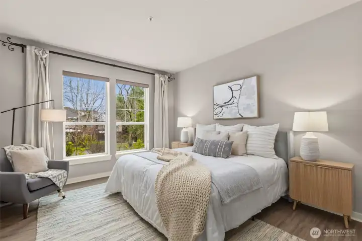 Primary suite is complete with walk in closet and en suite bathroom.