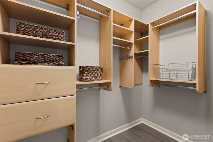 Primary walk-in closet with built in organzers