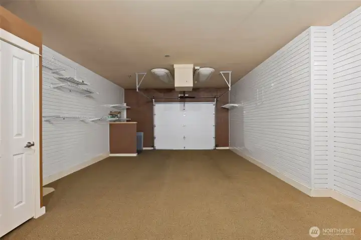 Large fully finished garage- makes a great "extra" living space or choose to use it as intended- for your cars!