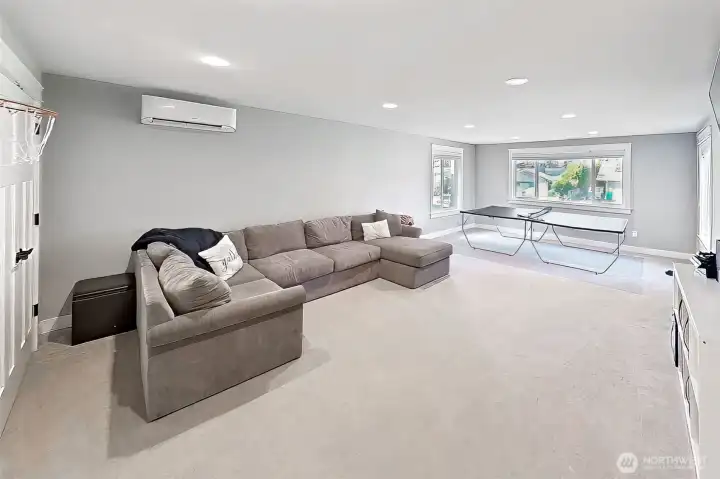 This bonus room is tucked just off the bedroom wing, it’s perfectly positioned to feel connected but still a little separate. A mini-split provides heat and air conditioning in the summer for ultimate comfort in this space.