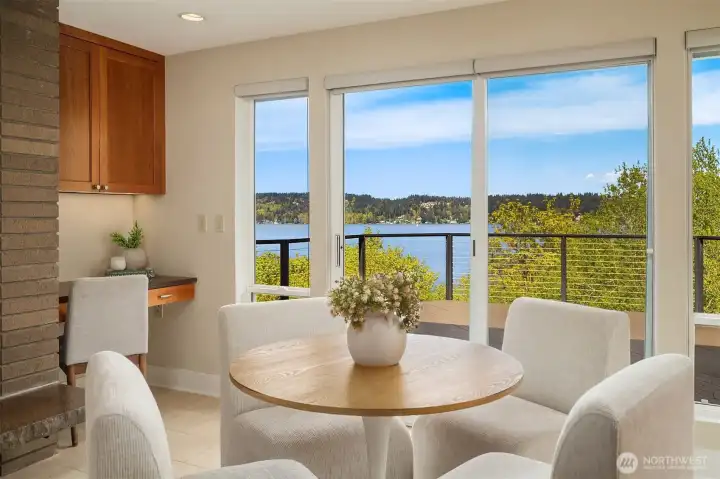 Enjoy mornings in this dreamy kitchen with gas fireplace and direct access to the deck.