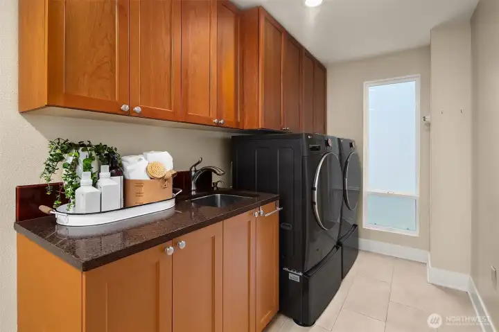 The mudroom with laundry off the 2 car garage.