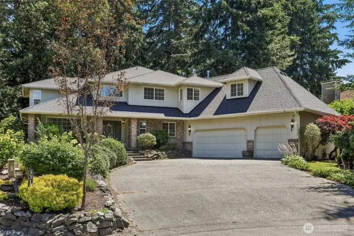 New roof and gutters. Home sits up above the cul-de-sac for perfect light, space and peacefulness. New roof and gutters. Home sits up above the cul-de-sac for perfect light, space and peacefulness.