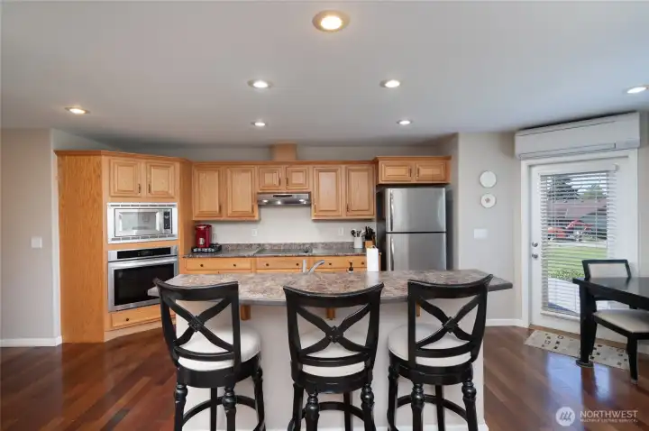 Kitchen eating bar and access to deck. Kitchen eating bar and access to deck.